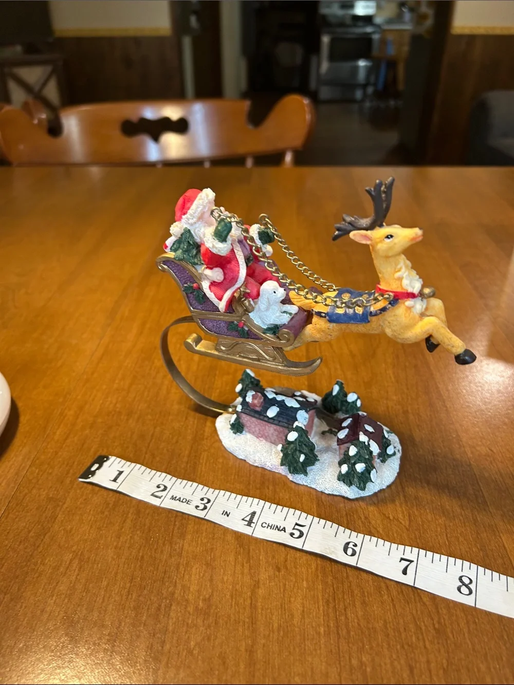 Festive Santa in Red Sleigh with Reindeer Holiday Figurine